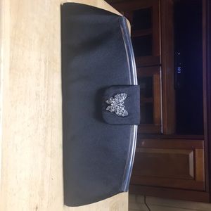 Dressy black satin clutch bag.